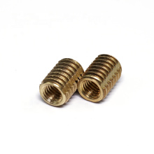 Stainless steel self tapping threaded inserts for plastics